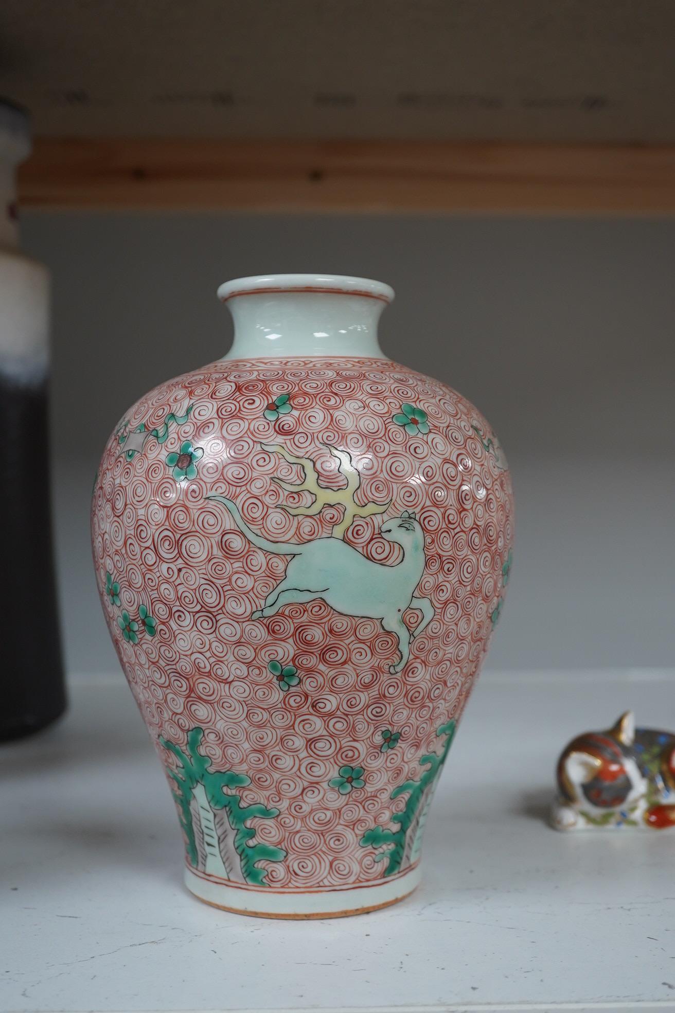 A Chinese famille verte jar, 19cm high. Condition - good